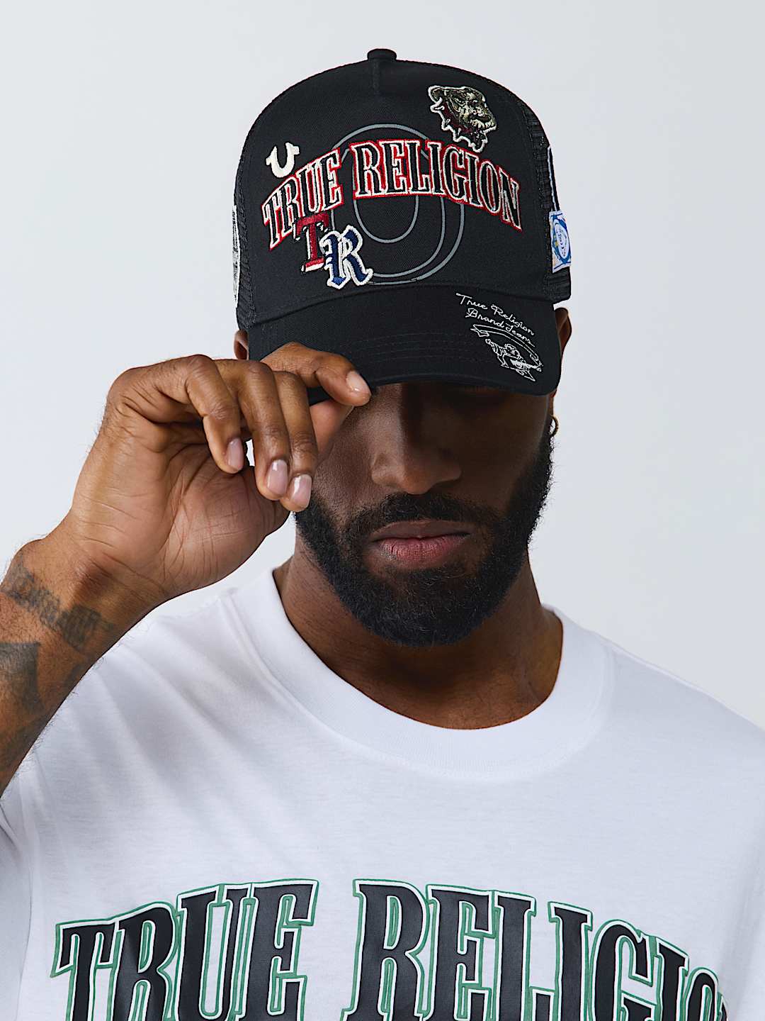 True Religion -Multi-logo Trucker Hat