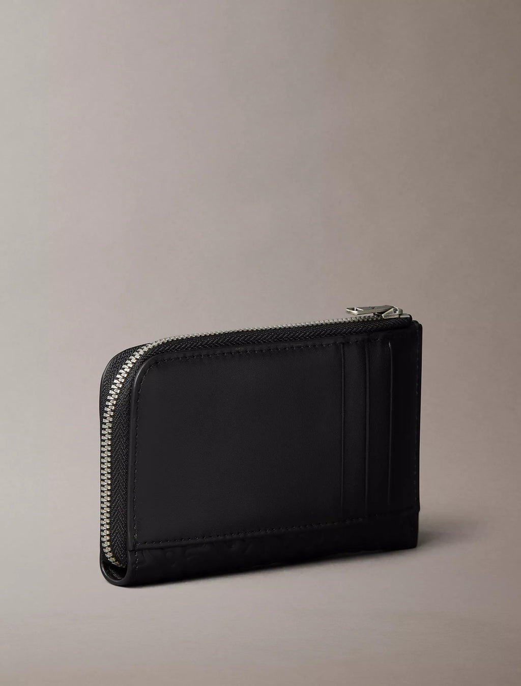 Calvin Klein - Embossed Allover Monogram Zip Wallet