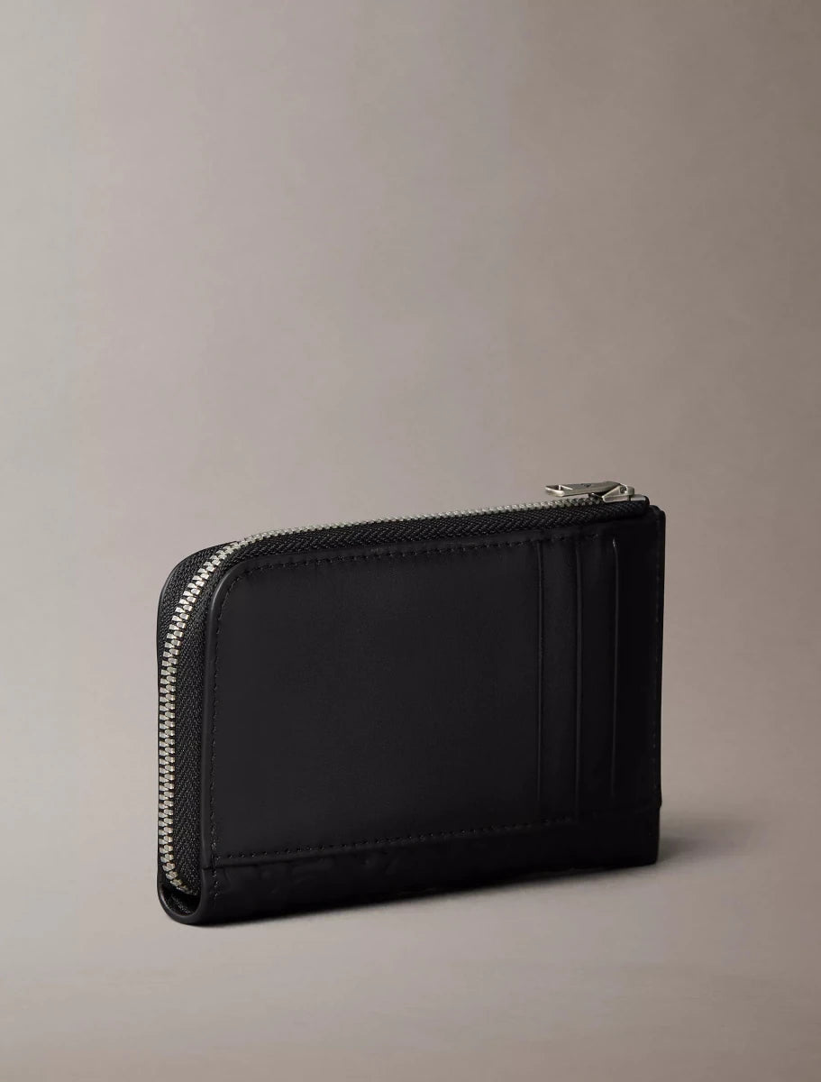 Calvin Klein - Embossed Allover Monogram Zip Wallet - Brandatak Store