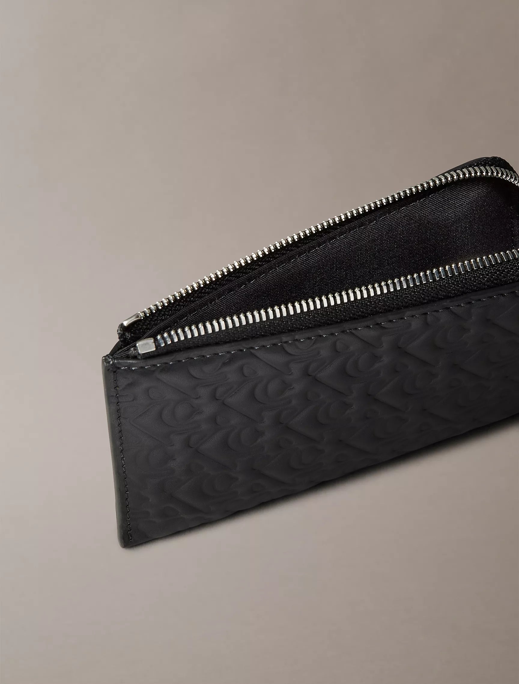 Calvin Klein - Embossed Allover Monogram Zip Wallet