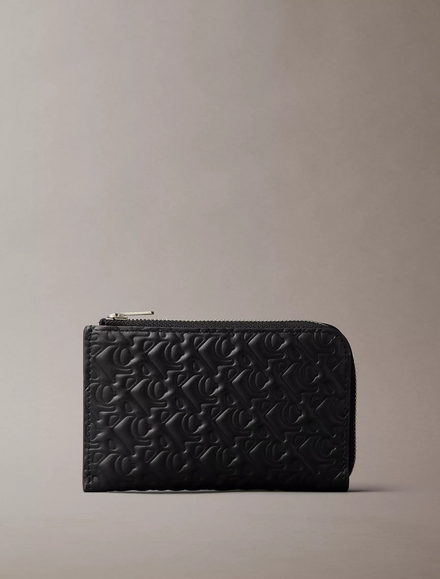 Calvin Klein - Embossed Allover Monogram Zip Wallet