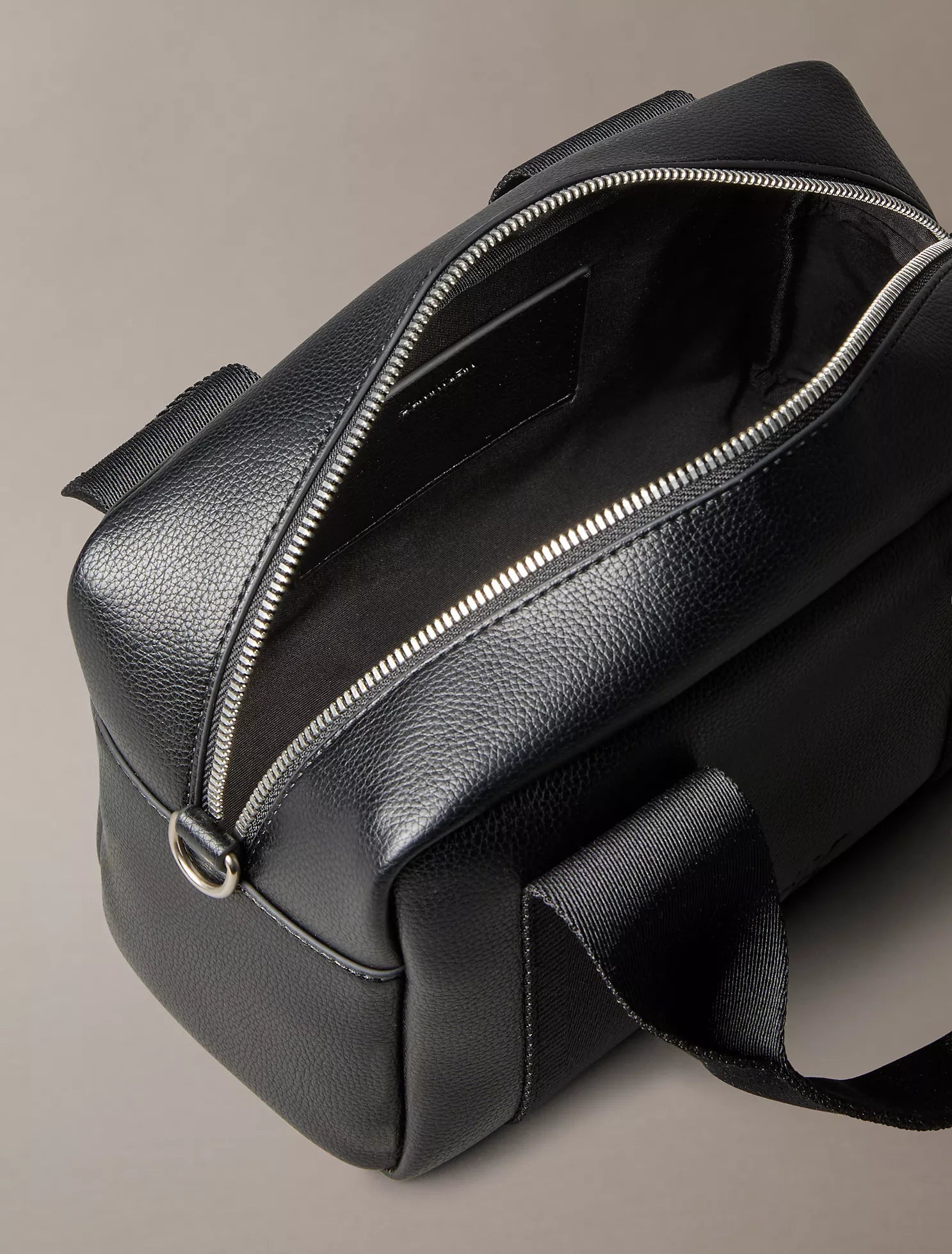 Calvin Klein -nUltralight Barrel Crossbody Bag