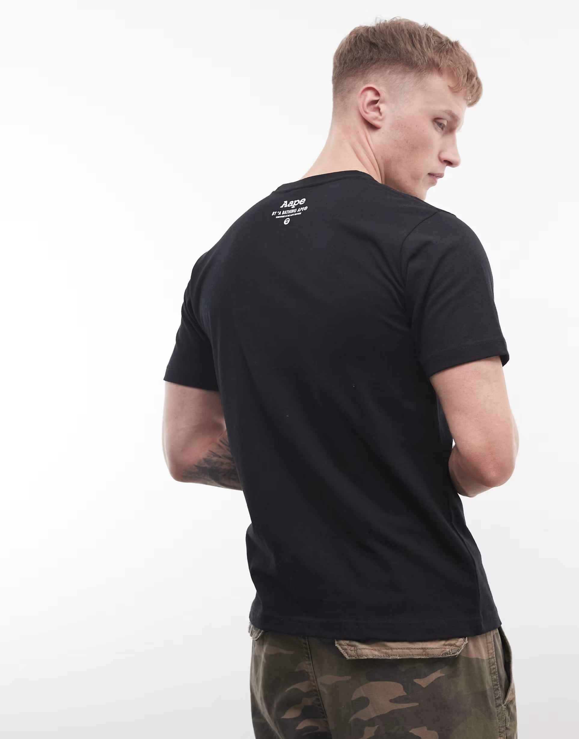 Aape - by A Bathing Ape t-shirt in black with camo logo print.