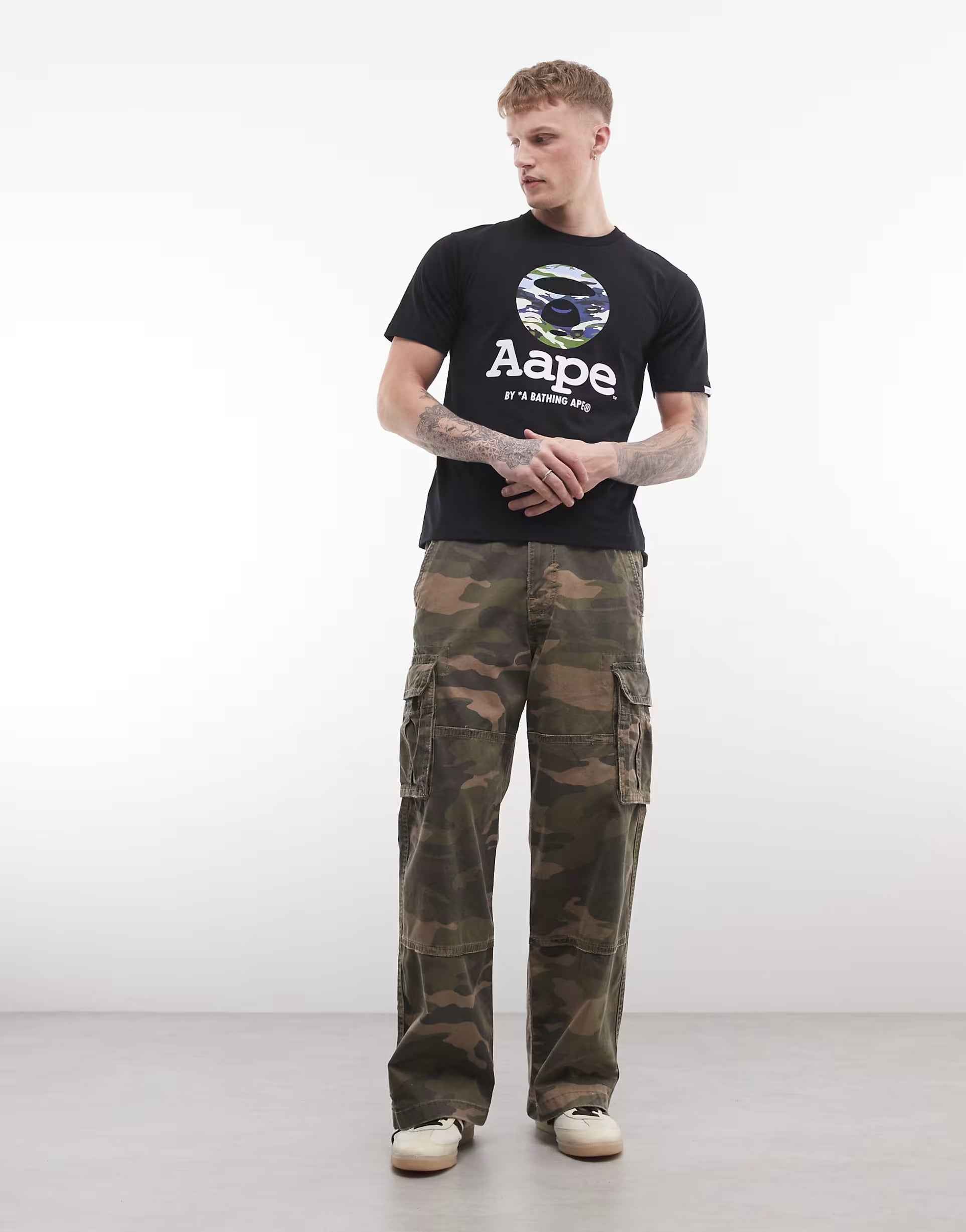Aape - by A Bathing Ape t-shirt in black with camo logo print.