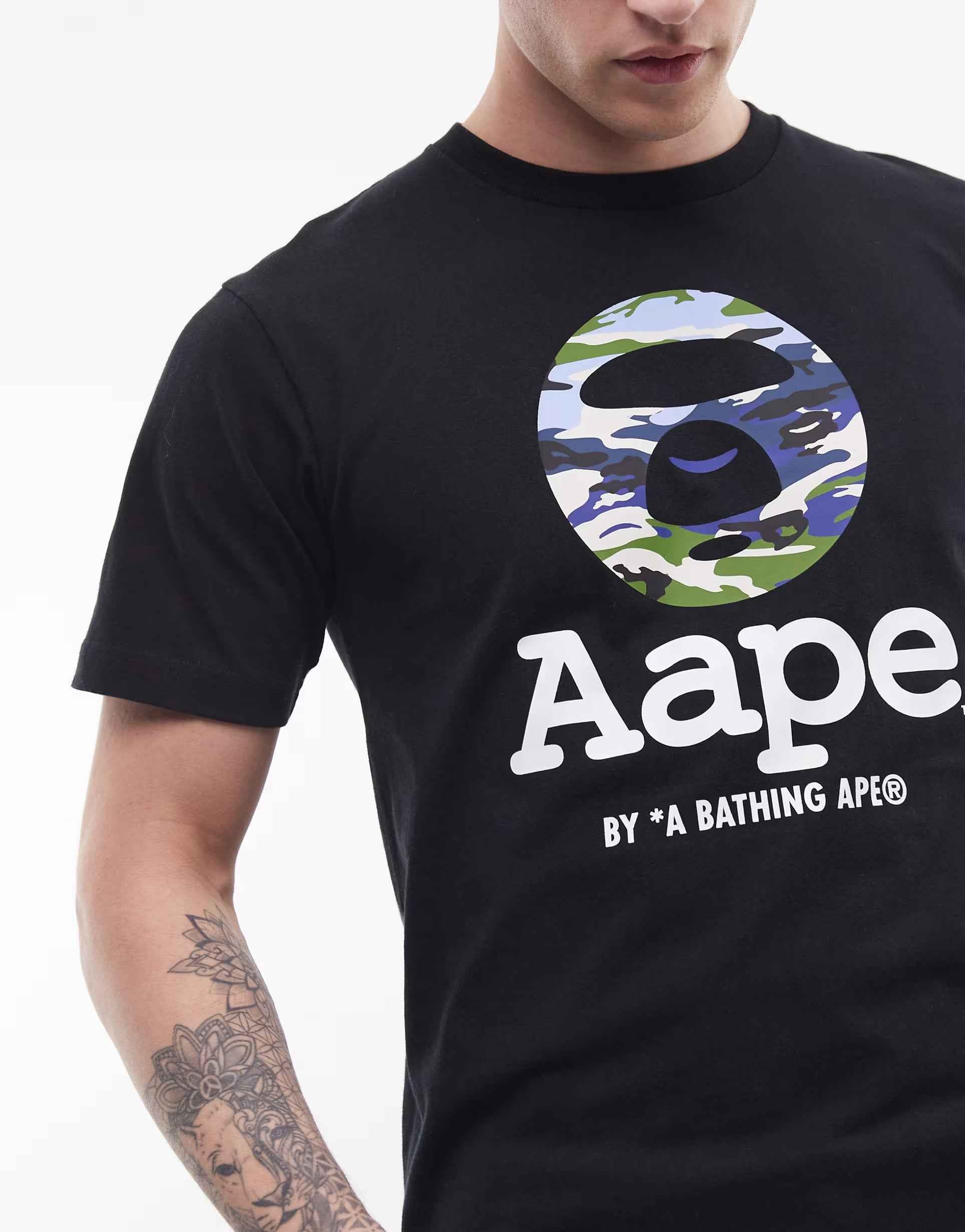 Aape - by A Bathing Ape t-shirt in black with camo logo print.