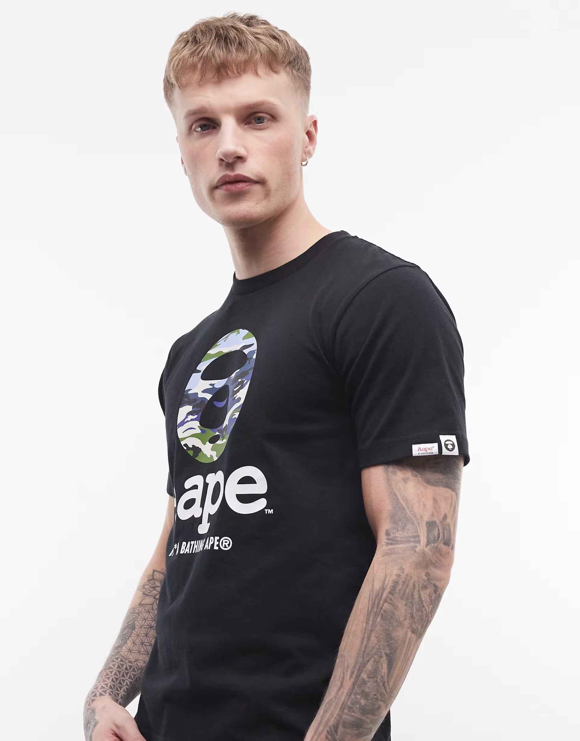 Aape - by A Bathing Ape t-shirt in black with camo logo print.