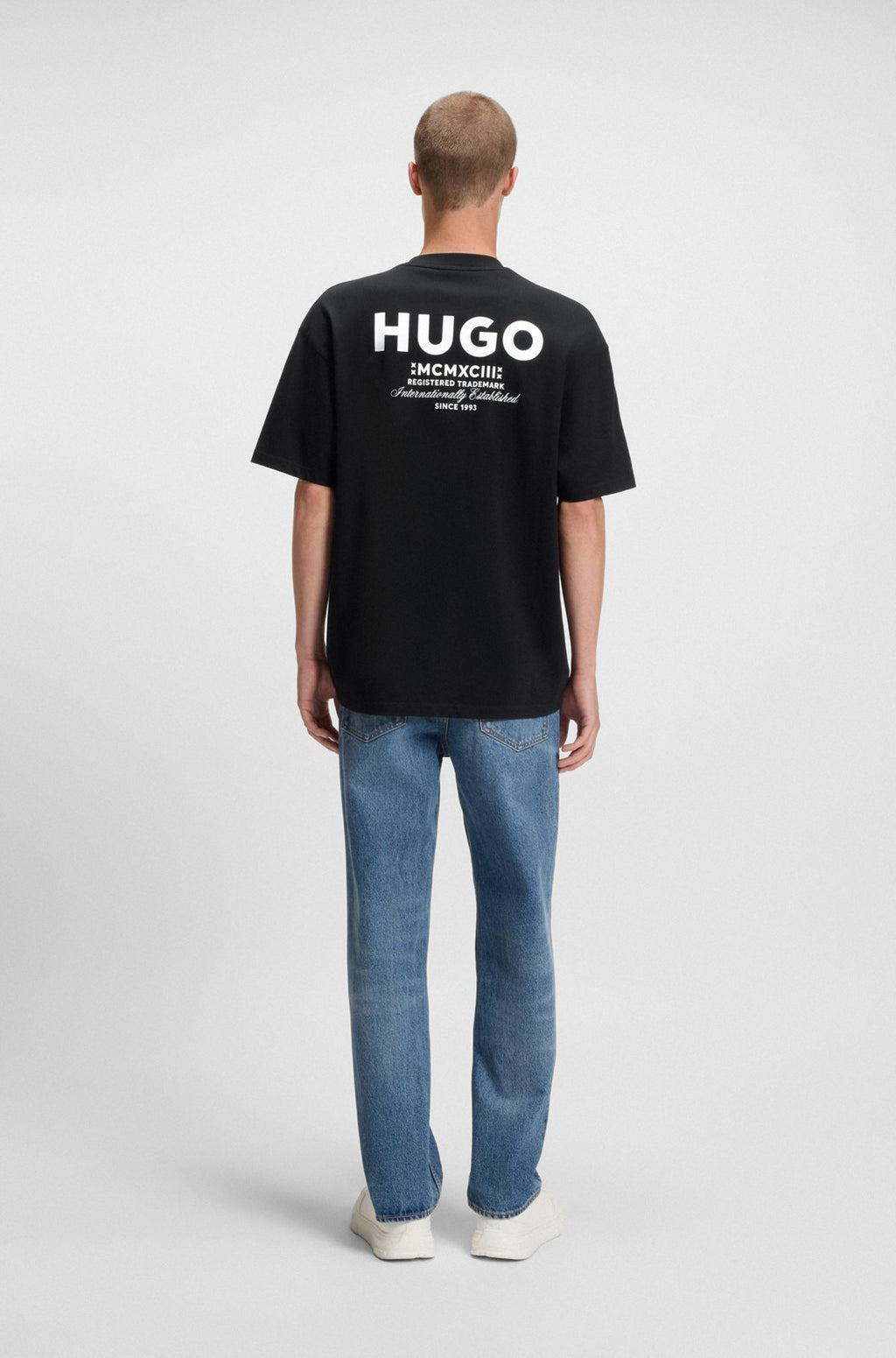 Loose-fit T-shirt in cotton with rear logo artwork