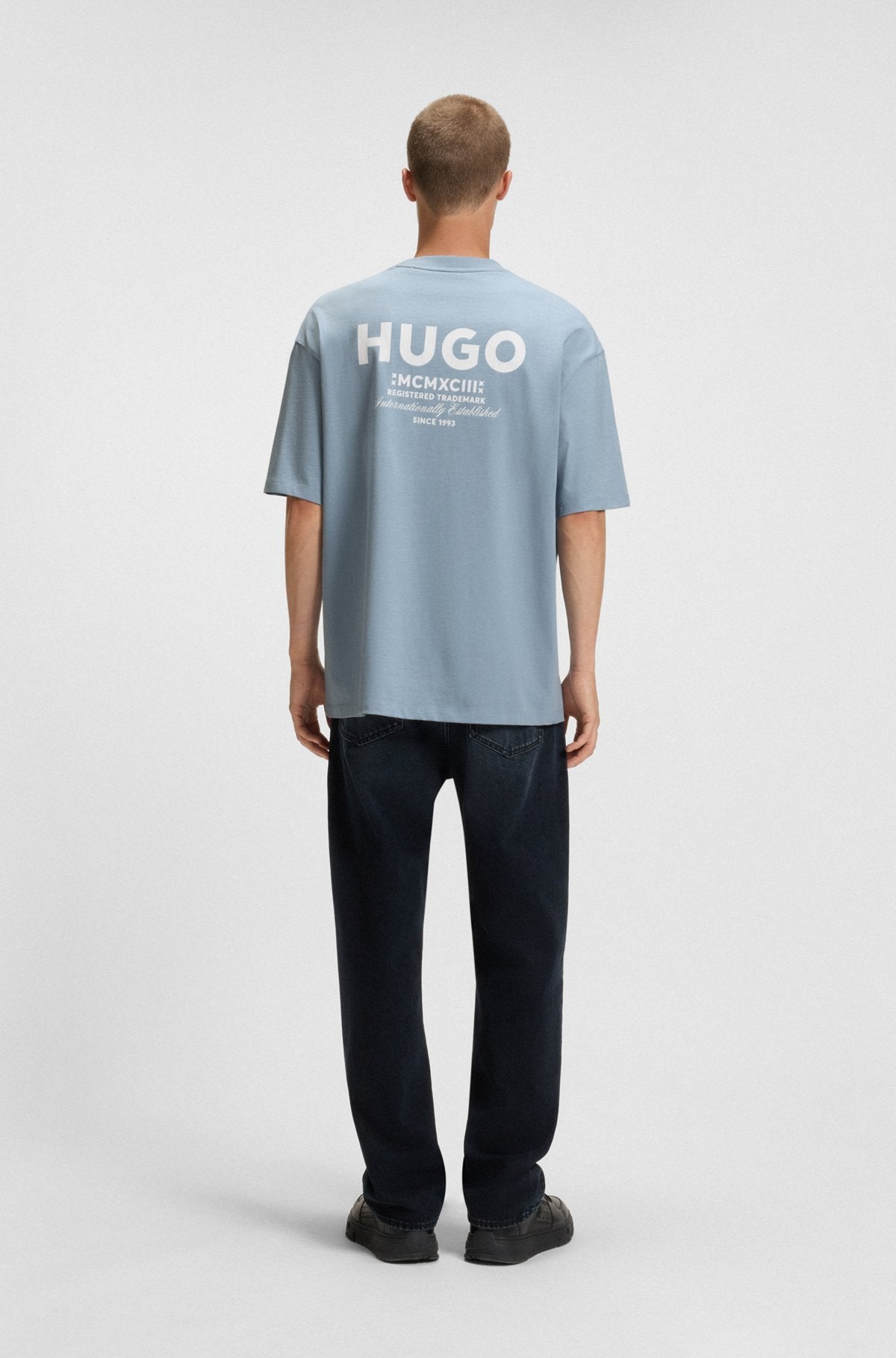 Loose-fit T-shirt in cotton with rear logo artwork