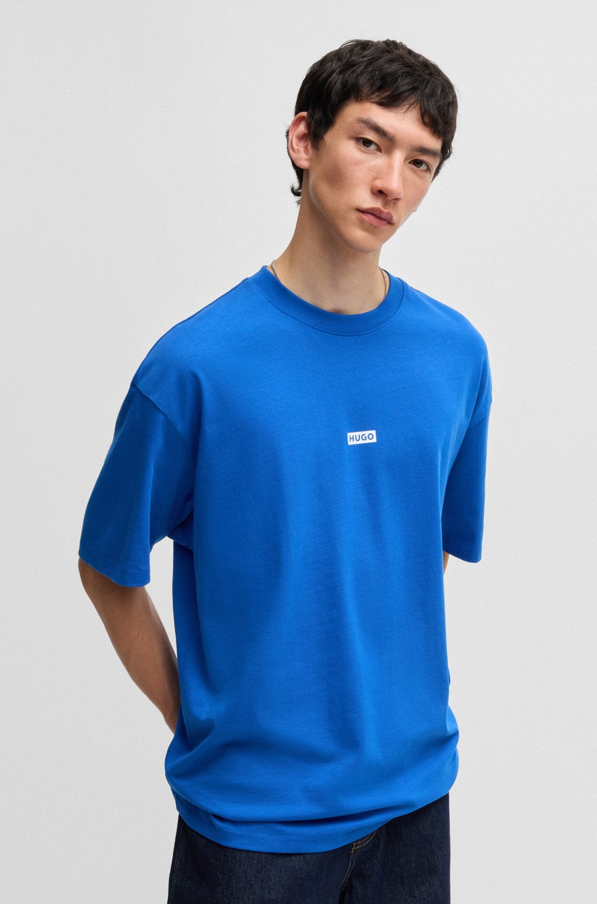 Loose-fit T-shirt in cotton with rear logo artwork